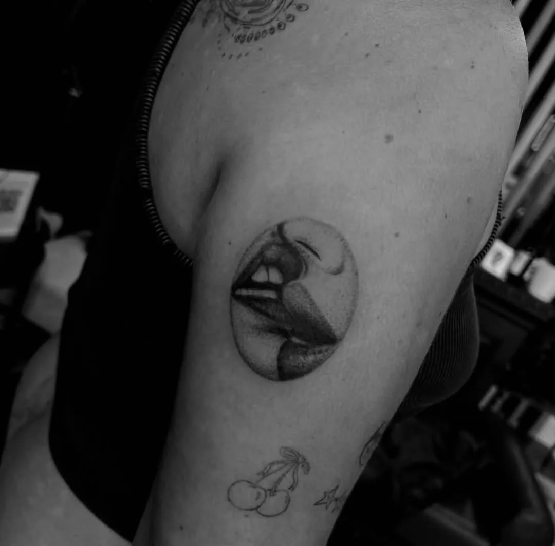 Micro realism lips on upper arm