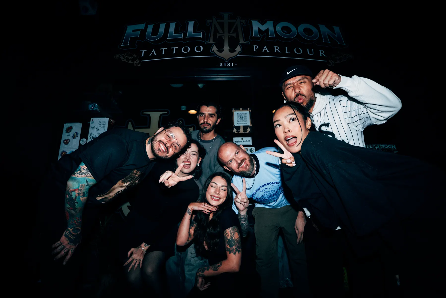 The Full Moon crew having a laugh outside the parlour