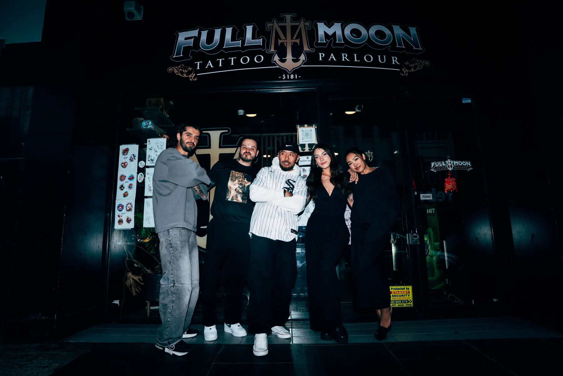 The Full Moon crew at the shopfront